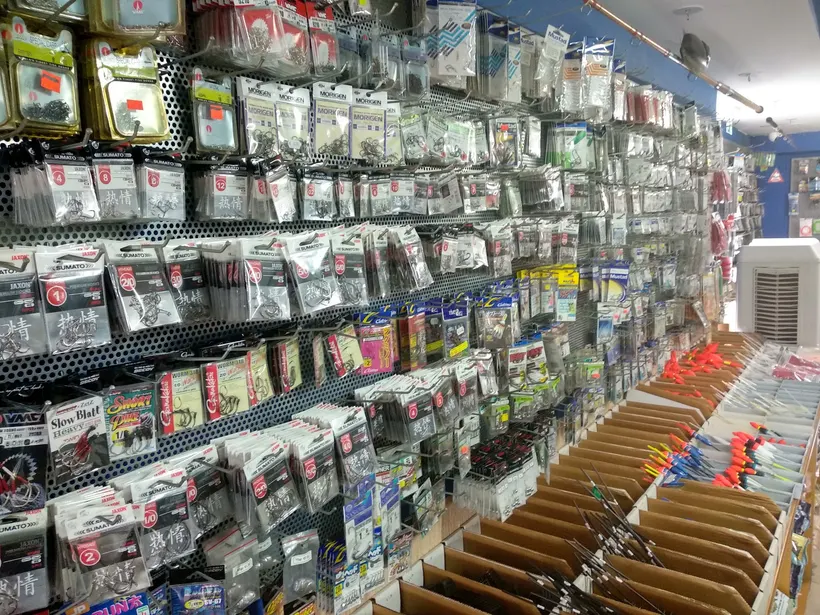Inside Fish Hunter: walls of hooks, rigs and tackle