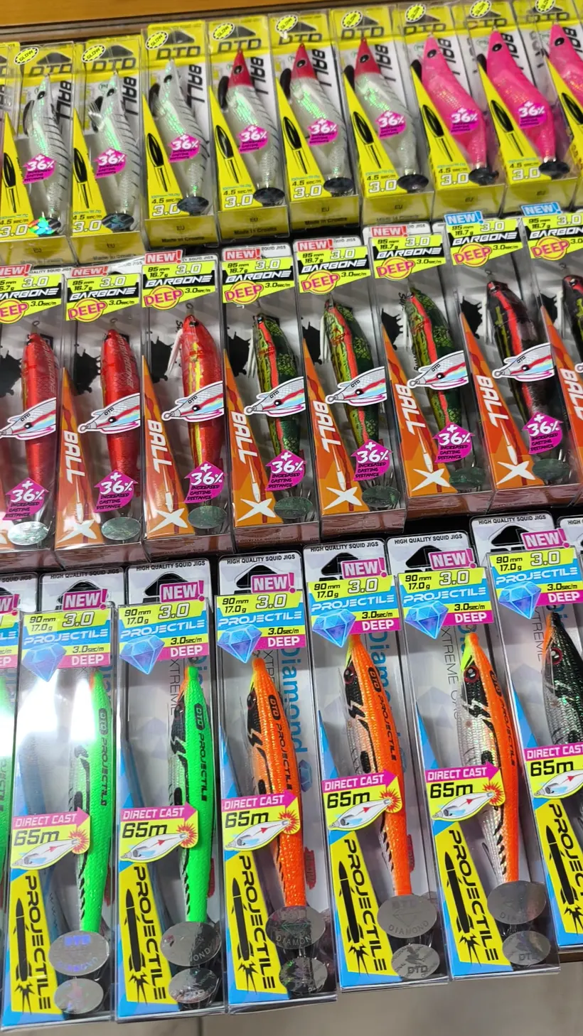 Rows of squid jigs hanging on the wall